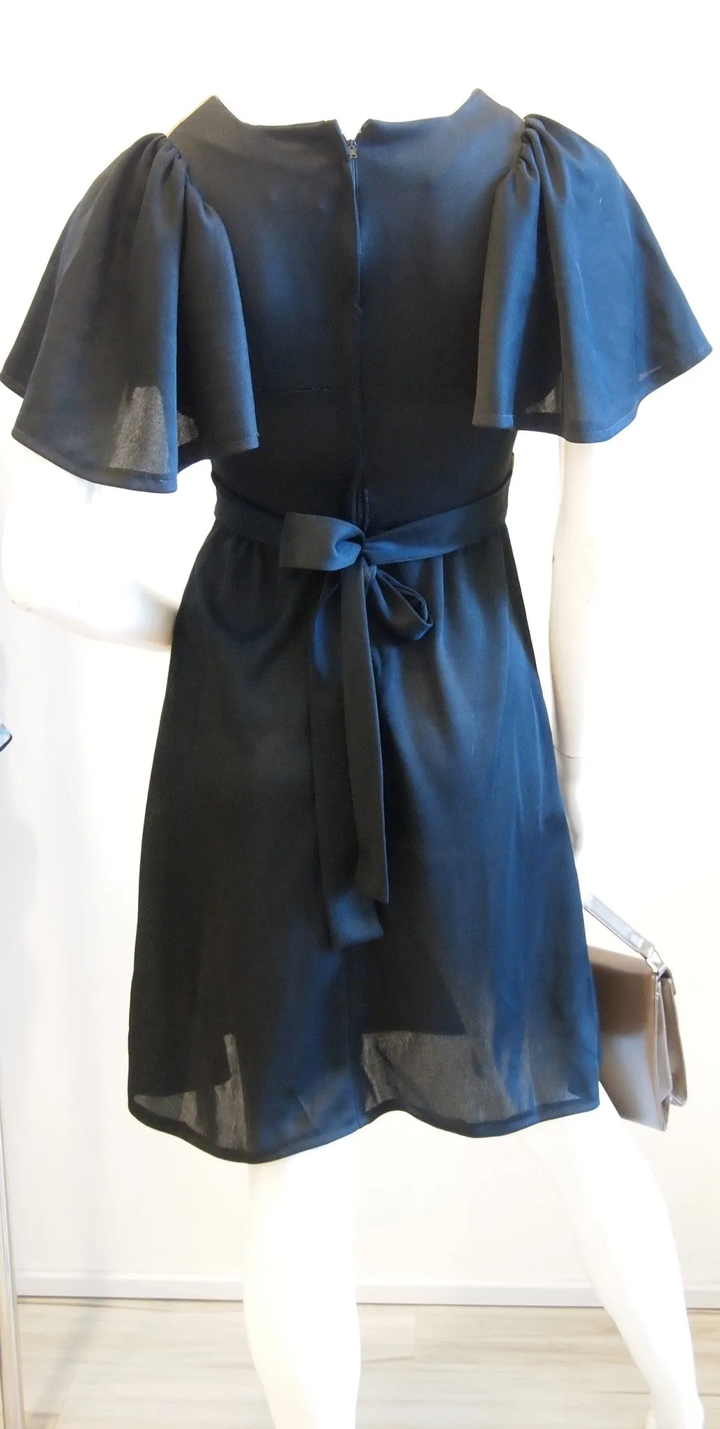 Black dress lily sleeves gold quilted collar and waist