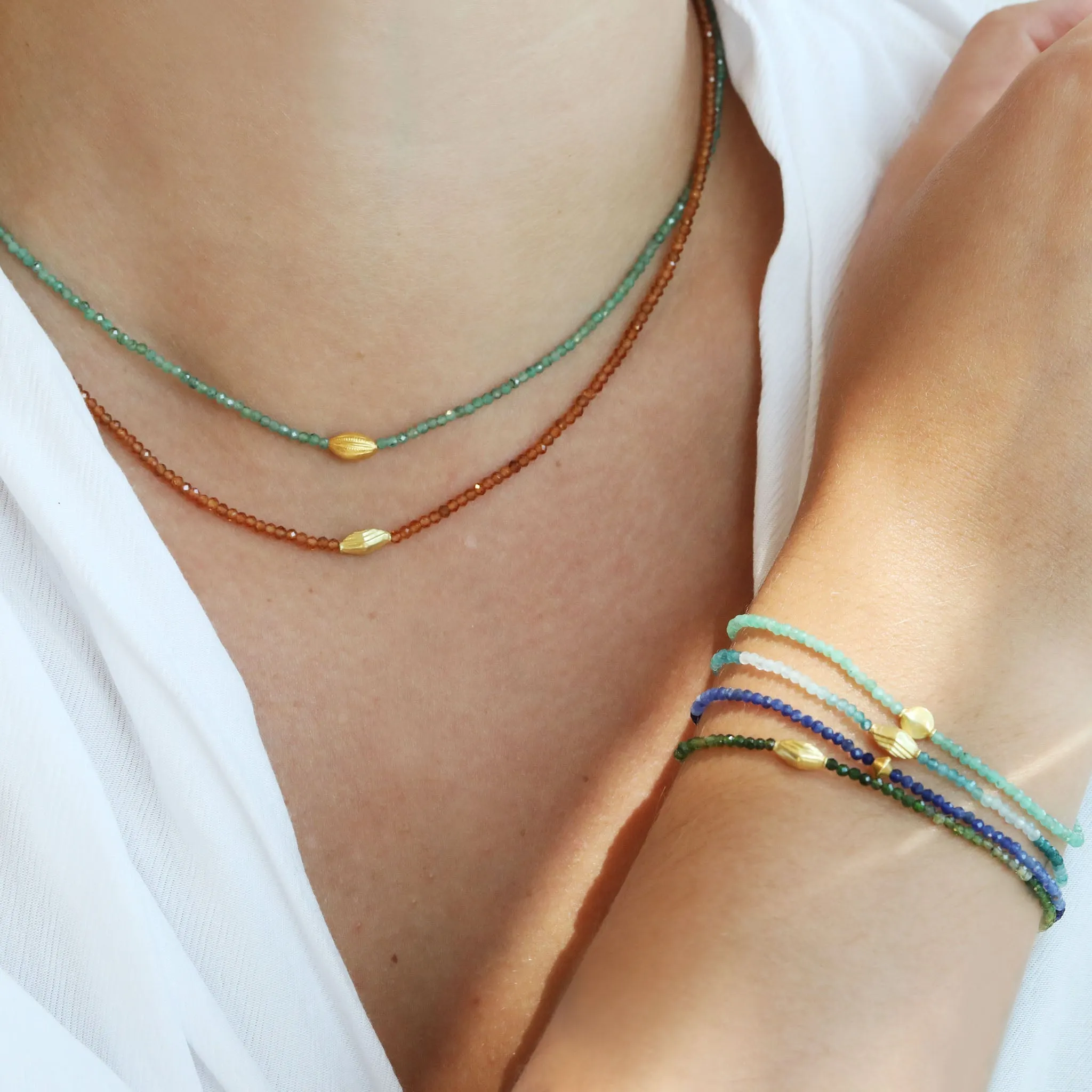 Faceted Grandidierite Beaded Bracelet with 18K High Polish Round Bead