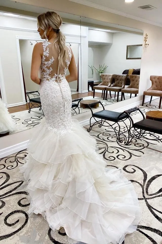 White Sleeveless V neck Wedding Dress with multi layers train